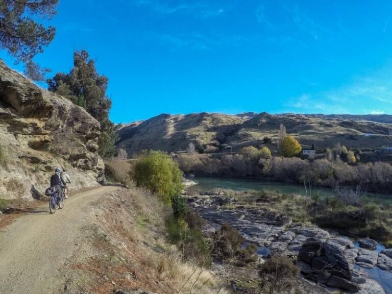 Couple biking on the Clutha Gold Trail in Central Otago near Ettrick